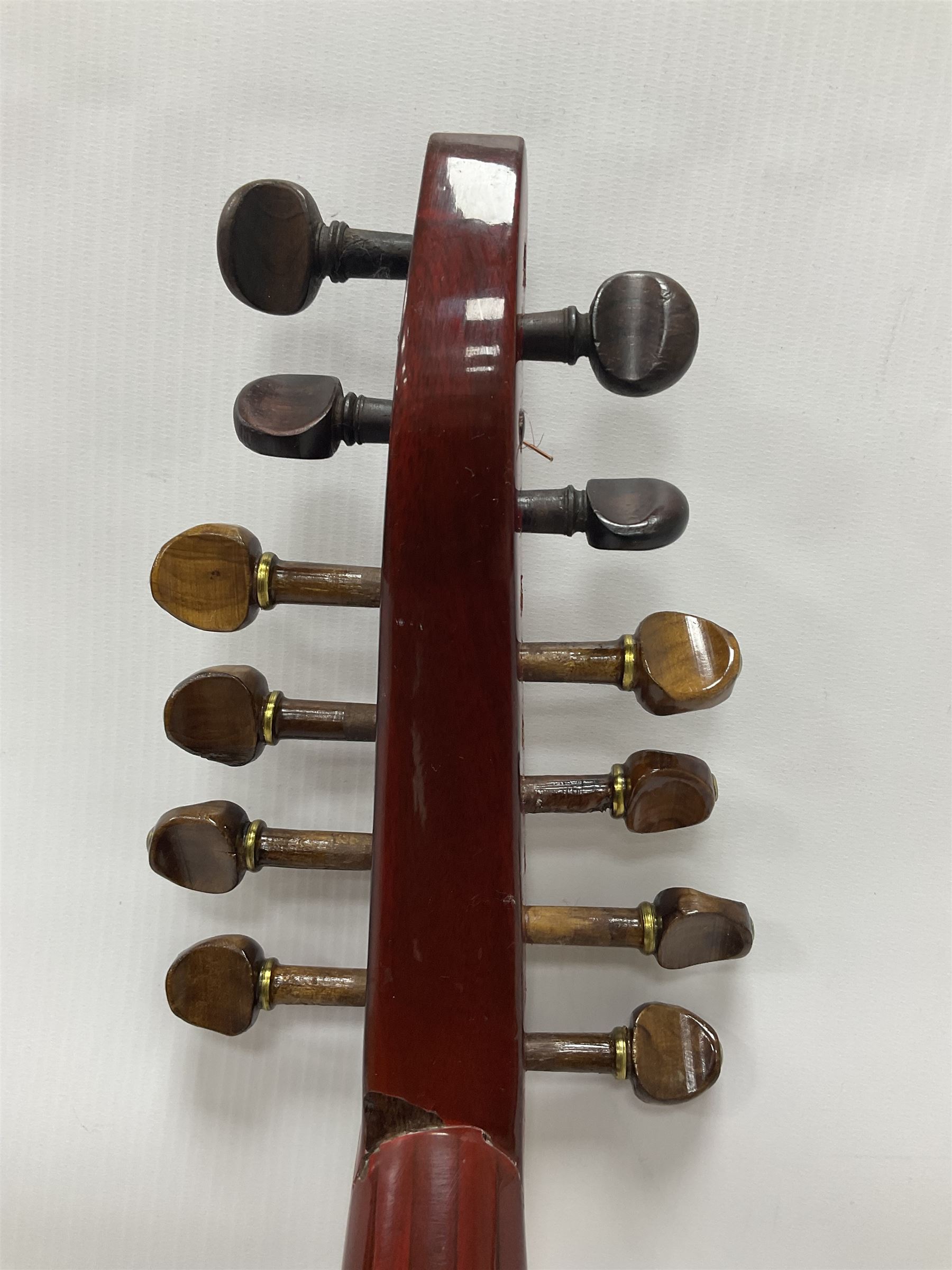 20th century Middle Eastern six string lute with a segmented back and a purpose designed hardwood stand