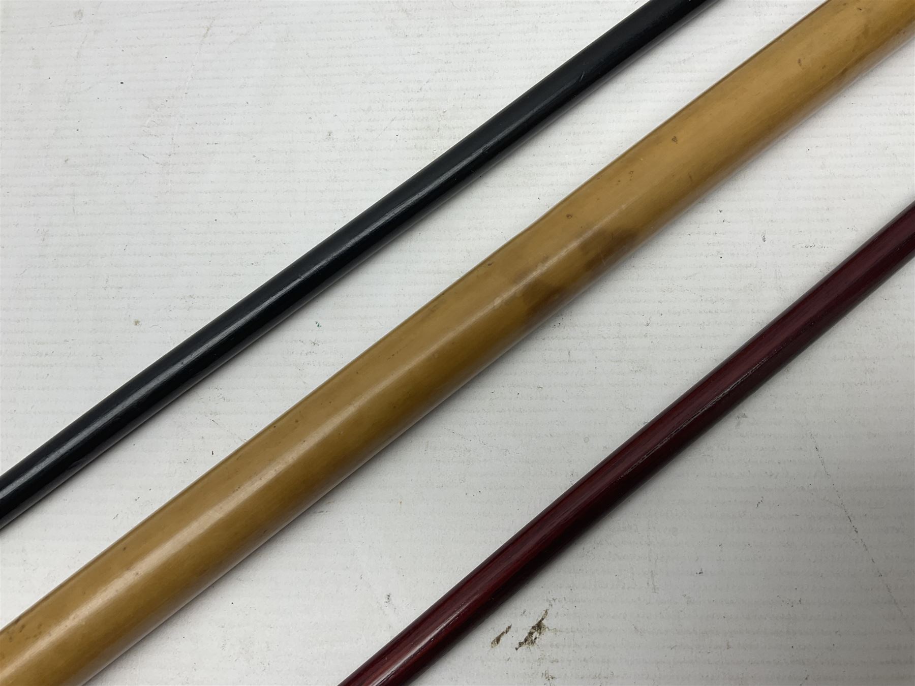 Three parade ground canes - malacca cane Coldstream Guards with plated mount engraved 'H.A. Myhan' L87cm; ebonised Church Lads Brigade 'Fight The Good Fight'; and mahogany stained Worcestershire Regiment (3)