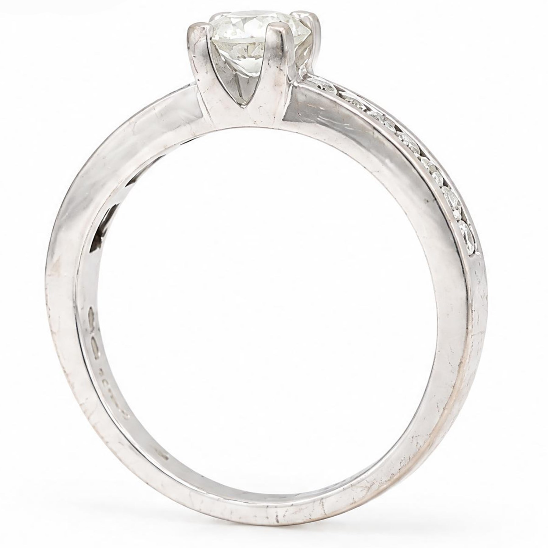 18ct white gold diamond ring, four claw set with a single round brilliant cut diamond of approx 0.40 carat and diamond set shoulders, London 2011