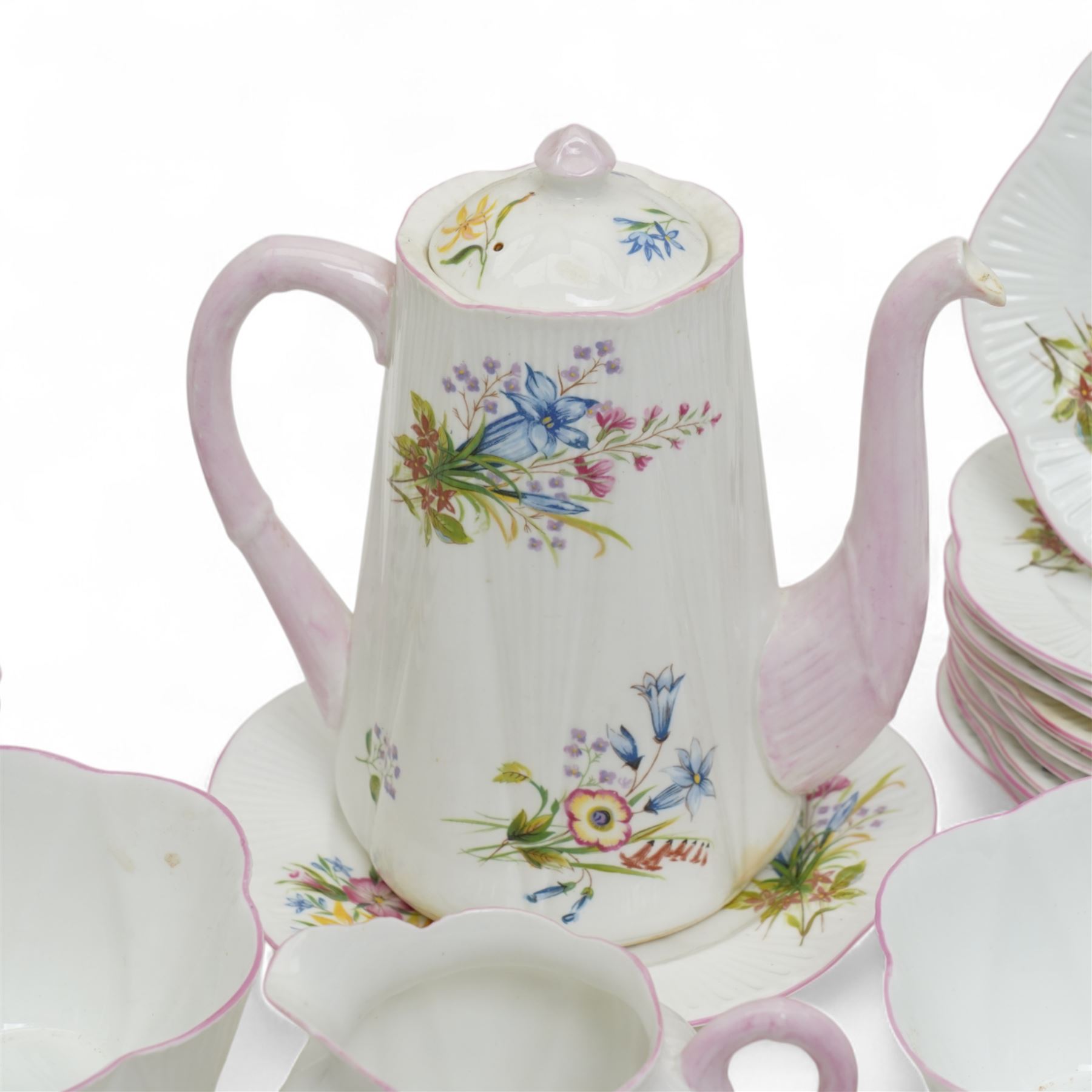 Shelley 'Wild Flowers' pattern part tea service, comprising four coffee cups, five coffee cup saucers, nine teacups, eight teacup saucers, coffee pot, three milk and cream jugs, two bowls, five cake plates etc