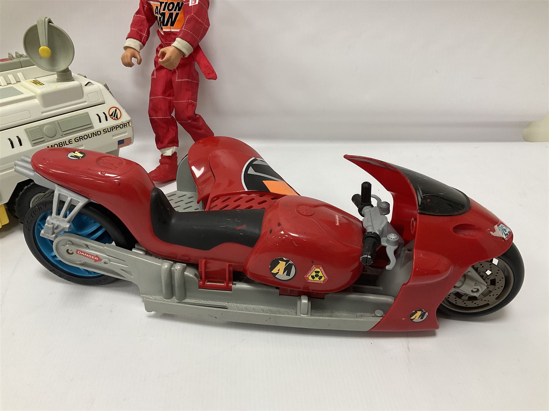 Manta Force Red Venom 1987 Bluebird Toys PLC toy plane with associated figures, with three more toy vehicles and figures comprising Lanard 1996 S.T.A.R Force Mobile Ground Support truck, Hasbro 2000 Action Man motorbike with side car, Sindy moped 