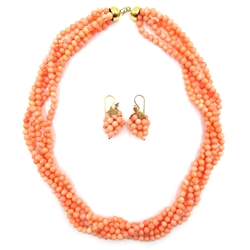  Five strand coral bead necklace on gold clasp stamped 750 and a similar pair of pendant coral ear-rings in the form of grapes  