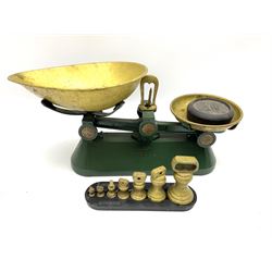 A set of kitchen scales and full set of weights, with stand. 