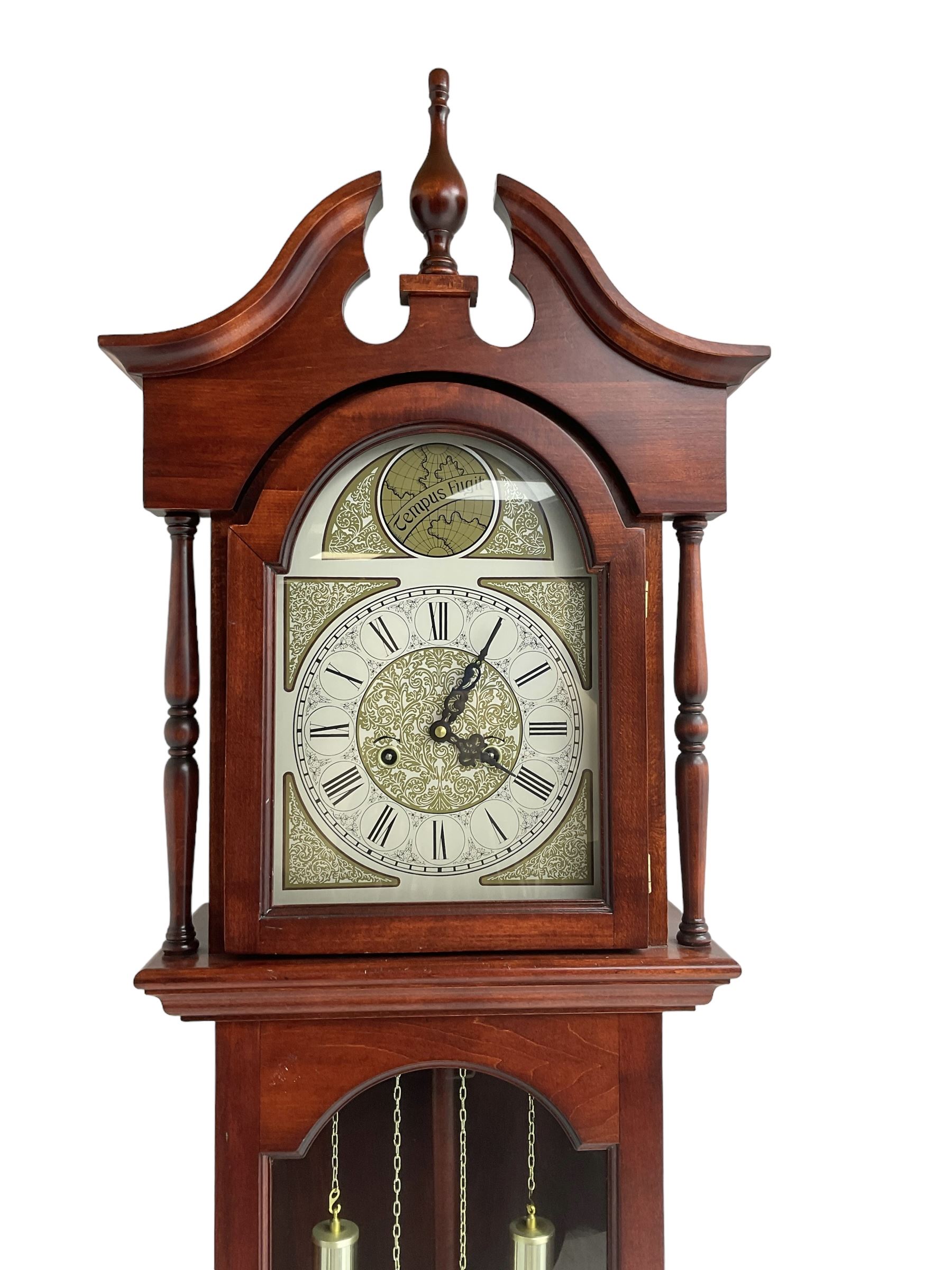 Late 20th century - Mahogany cased spring driven longcase clock, with an etched brass and silvered dial and pierced steel hands, fully glazed trunk door with visible pendulum and dummy weights, striking the hours and half hours on a gong.