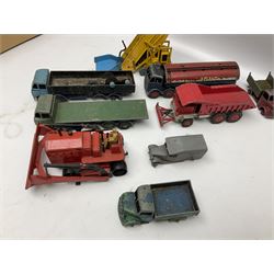 Dinky - twenty-six unboxed and playworn die-cast models including Foden Regent Tanker, two Foden lorries, Pressure Refueller No.642, Snow Plough, Elevator Loader, Foden Dump Truck, Blaw Knox Bulldozer and other commercial vehicles