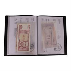 Great British and World banknotes, including many uncirculated examples, housed in ten folders