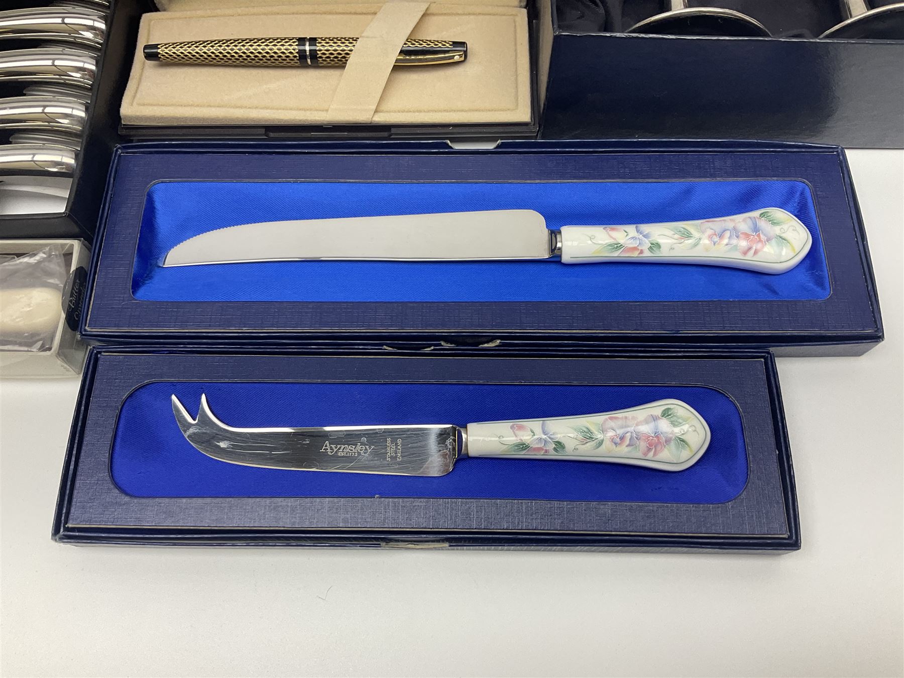 Silver plate including set of six Oneida steak knives with pistol grip handles, in original box, set of six cased cake forks, pair of goblets, etc, together with a pair of Belleek Celtic pattern mugs, 