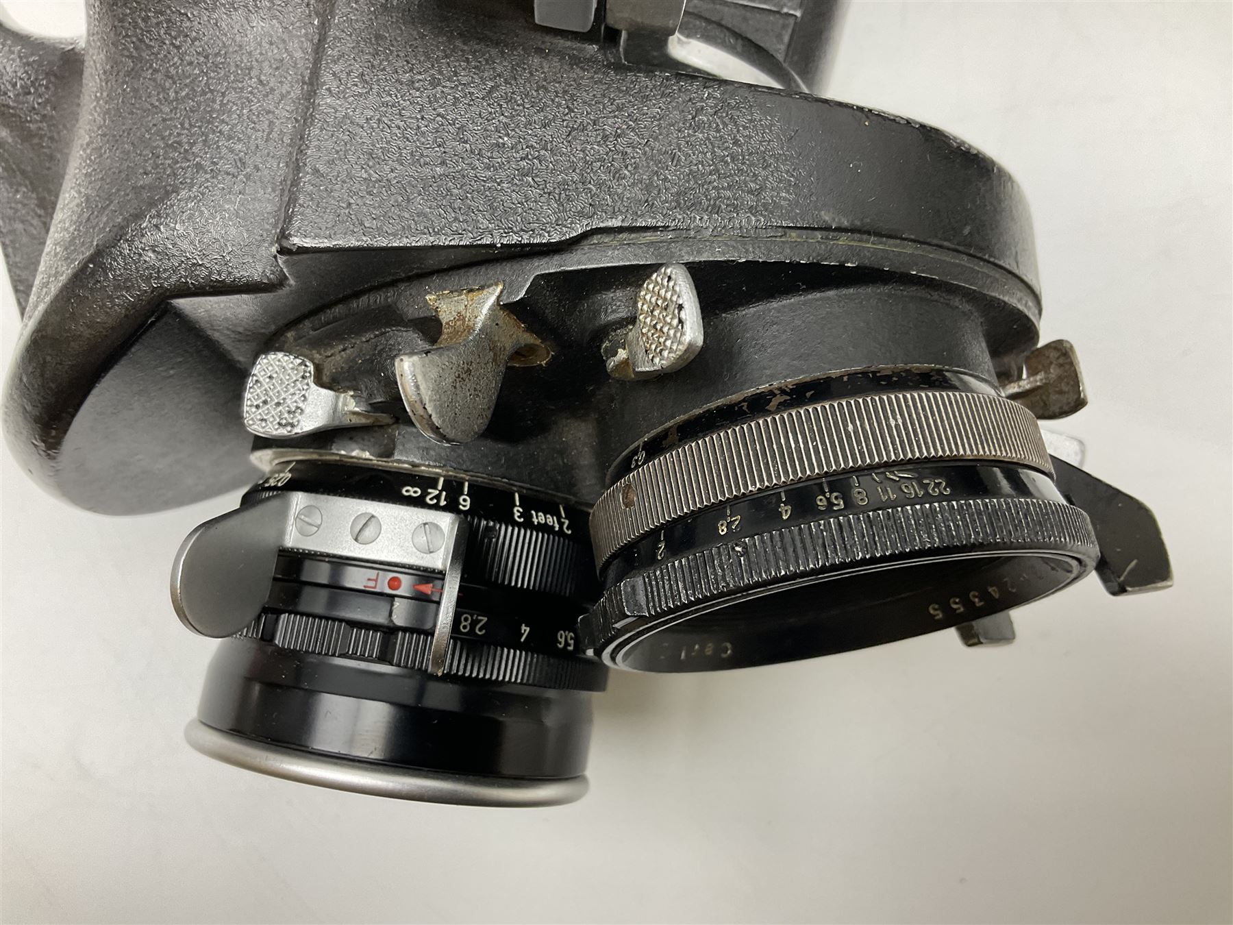 Arriflex 16SB camera body, serial no. 1784, with ' Carl Zeiss Distagon 1:2 f=8mm' lens, serial number 3860224, 'Carl Zeiss Jean Tessar 2/16' lens, serial no 3624355, camera pistol grip and other accessories, in fitted hard case