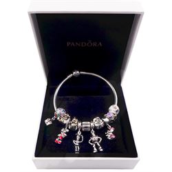 Silver Pandora bracelet with nine Disney Pandora charms including Minnie Mouse, the house with balloons from 'Up', and characters from 'Toy Story', 'Beauty and the Beast', 'Frozen', 'The Lion King' and 'Winnie the Pooh', with two other silver Pandora charms and Pandora box