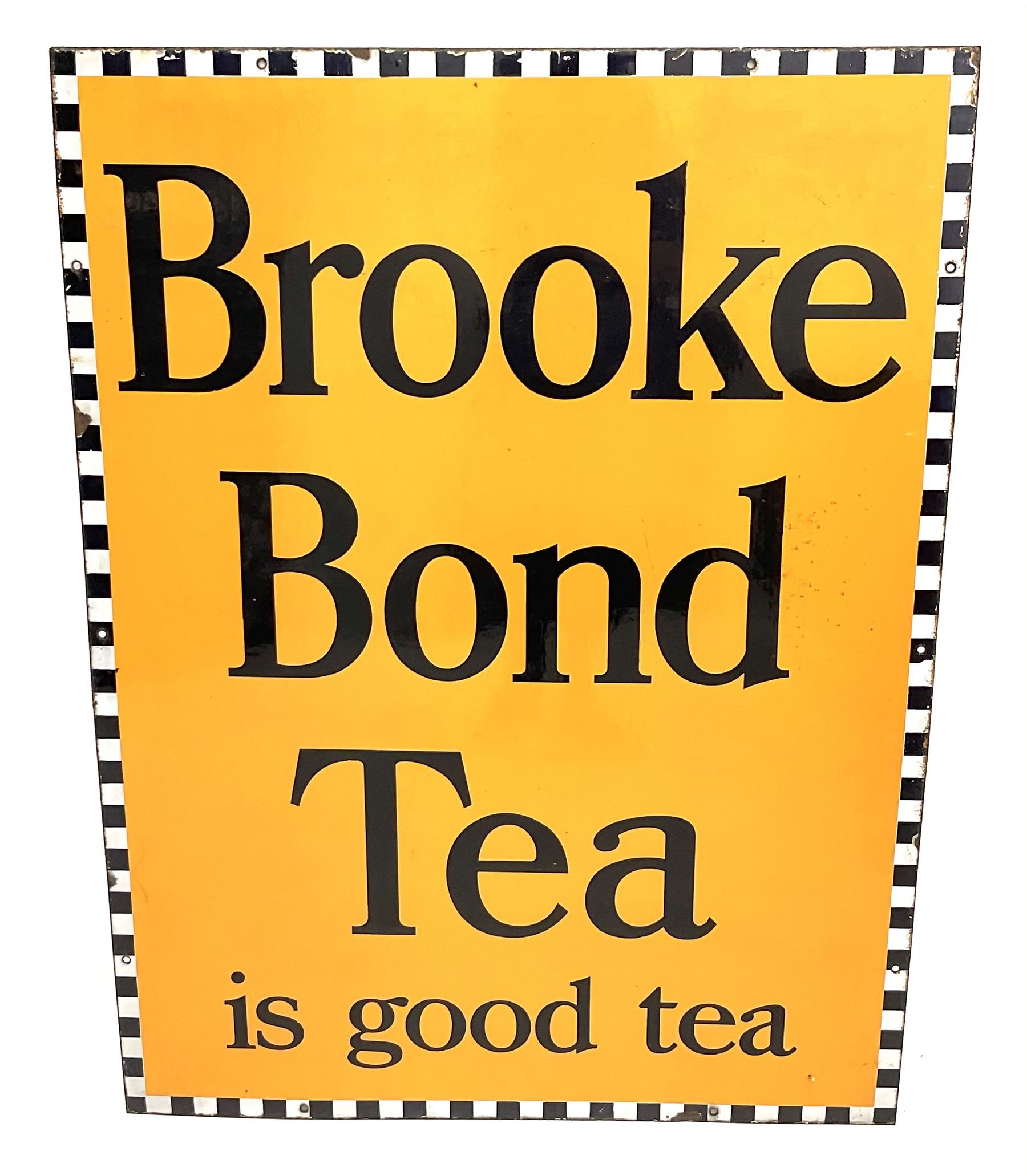 A large enamel advertising sign for Brooke Bond tea, detailed 'Brooke Bond Tea is good tea' in black lettering upon an orange ground with black and white chequered border, H101.5cm, W76cm. 