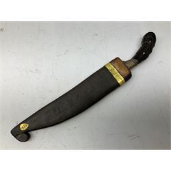 19th century Singhalese knife pia kaetta, the 20cm steel blade inset with yellow and white metal, with metal mounted carved pistol grip, in plain wooden scabbard L33cm overall