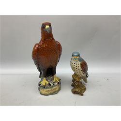Four Beswick Beneagles Whisky decanters to include Golden Eagle and otter, another White & Mackay decanter, and figure modelled as an eagle no.2316, all with marks beneath (6)