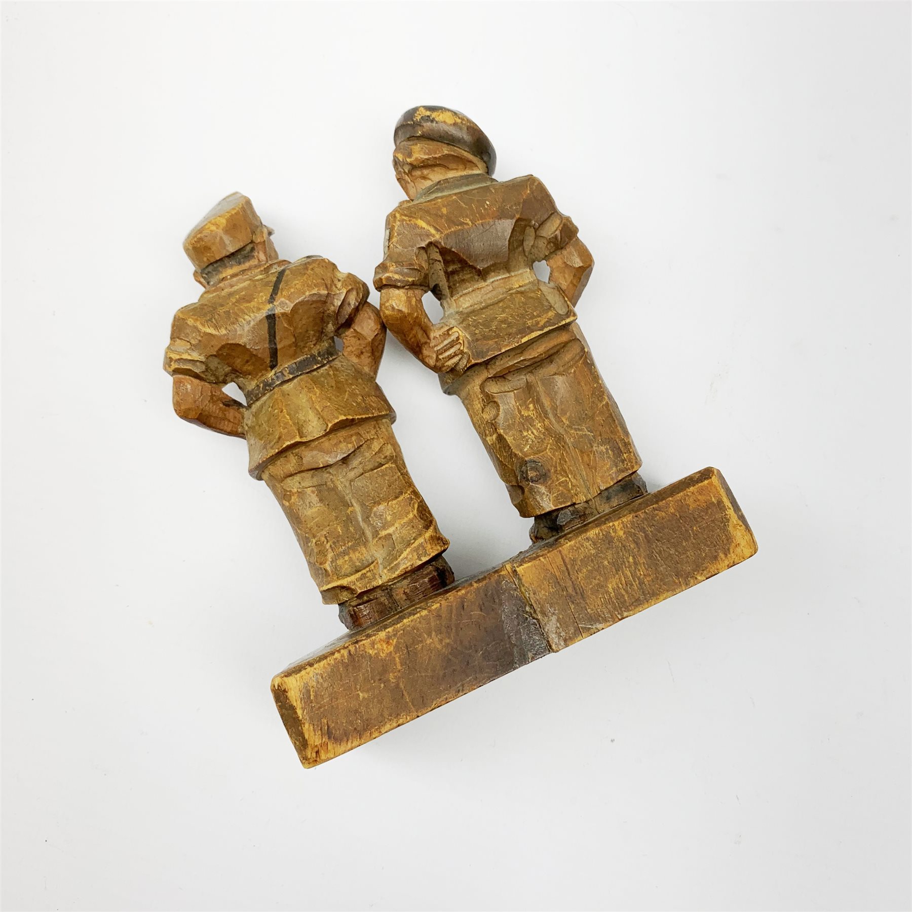 Caricature wooden carving of two WW2 British officers, inscribed under the base 'Venice March 1946' H13cm; and unmarked pair of binoculars (2)