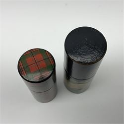 Mauchline ware black lacquered octagonal bobbin box, the hinged cover with forget-me-not floral decoration and sentimental verse, opening to reveal six bobbin holders and retail label for Clark & Co, together with a Mauchline ware sewing box, with floral decoration throughout and verse to hinged cover, a similar black lacquered needle holder and a Mauchline Tartan ware needle holder, largest diameter D11.5cm