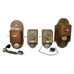 Two Hunningscone patent wall mounting telephones in walnut casing, together with Sterling Telephone & Electric Co. Ltd early wall-mounted telephone 'Primax' and one other 