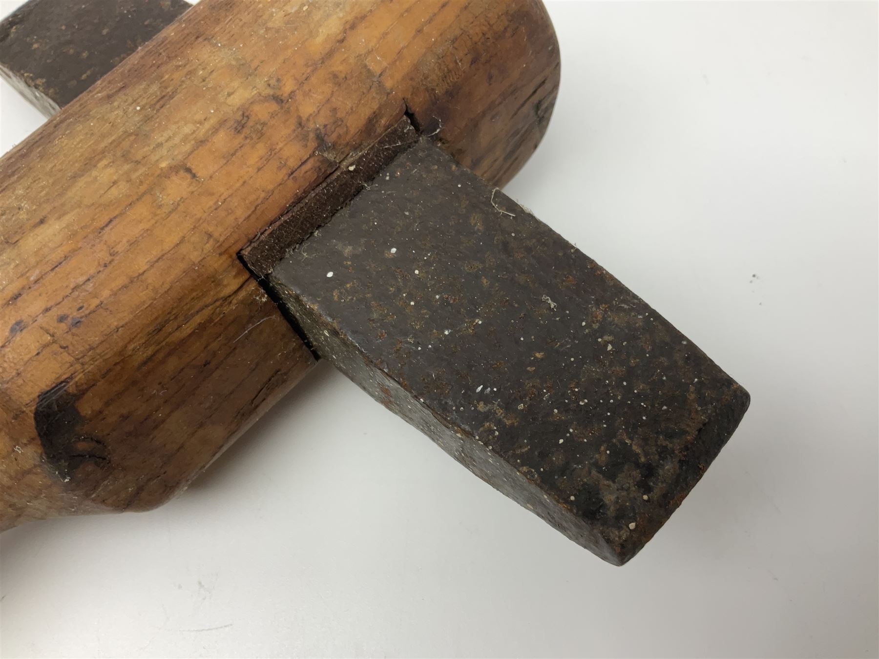 Post-War military type fireman's axe impressed 'PERKS 1953/54' with additional indistinct mark probably WD arrow, ash handle L39cm; and another stonemason's(?) double headed axe with mallet shaped shaft (2)