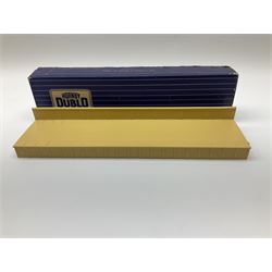 Hornby Dublo - six D1 accessories comprising Turntable; Through Station with white edges and separately boxed Platform Extension with Wall; Signal Cabin with orange roof and pack of station names; Level Crossing; and Island Platform; all boxed (6)