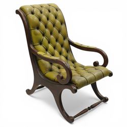 Regency design slipper chair upholstered in buttoned green leather, down swept arms with p...