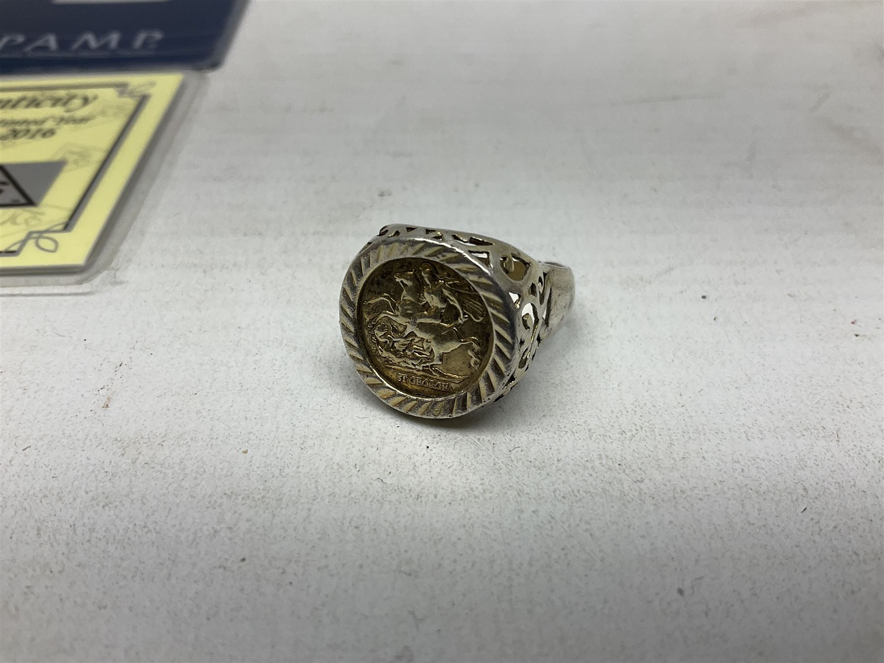 Silver mother of pearl handled fruit knife, silver jewellery including masonic pendant necklace, shell pendant, coin ring, Claddagh ring and charms etc, and a collection of ingots