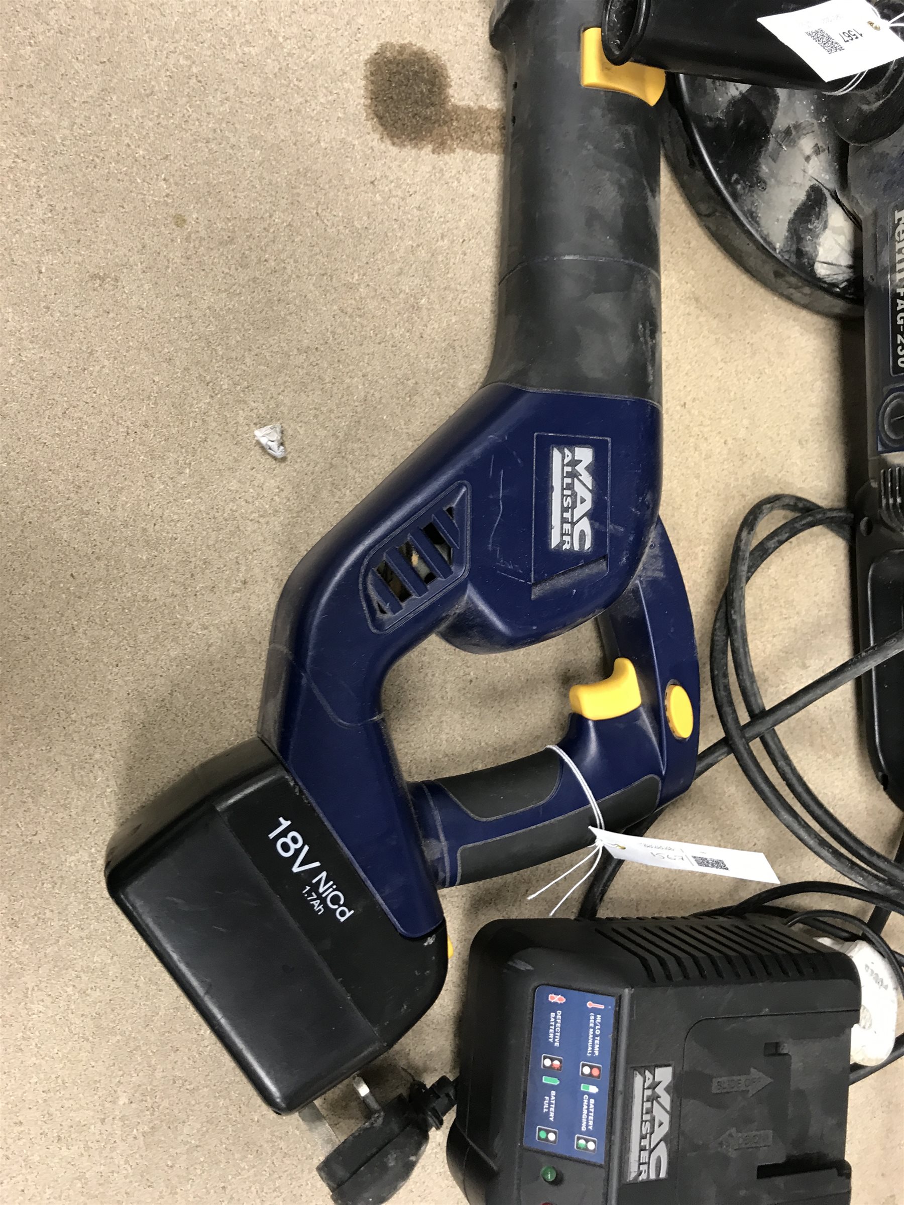 A quantity of hand tools including a Ferm FAG-230 angle grinder, a MacAllister reciprocating saw, a jig saw etc