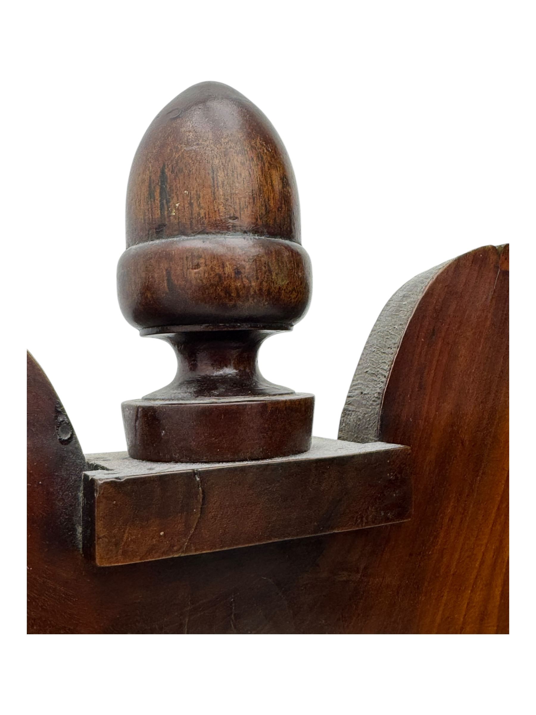 19th-century mahogany bookcase top with two glazed doors and pediment with acorn finial 