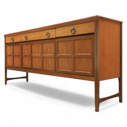 Nathan - mid 20th century teak sideboard, fitted with three drawers with brass ring handles, above a central fall front cabinet, flanked by two cupboard doors, raised on square tapering supports