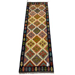 Chobi Kilim runner, multi-colour ground and decorated with geometric lozenges