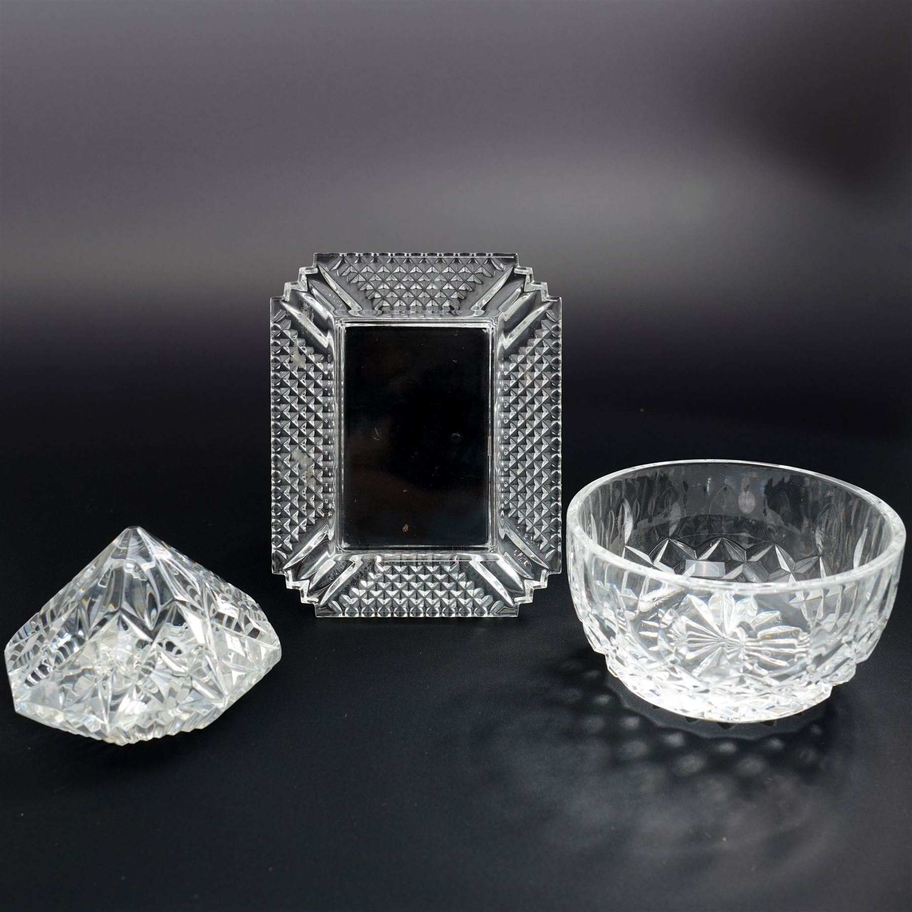  Waterford glass items including pair of Lismore pattern candlesticks H16cm, Makefield pattern photograph frame 12cm x 10cm, cone shape octagonal paperweight and a finger bowl