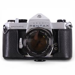 Asahi Pentax Spotmatic 35mm SLR camera, with Super-Takumar 1:1.8/55 lens, Petri Racer rangefinder camera and a Zenit-E camera, all in leather cases