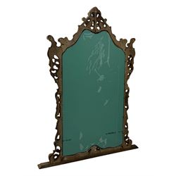 Victorian design gilt framed overmantel mirror, the arched and moulded frame adorned with scrolling foliate motifs and acanthus leaves, surmounted by a pierced cartouche, plain mirror plate, resting on a shaped base