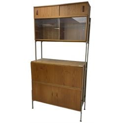 Remploy - mid-20th century teak sectional wall display unit or room divider, raised display cabinet section with sliding glass doors, central fall front section, lower double cupboard section and an additional sliding door section 