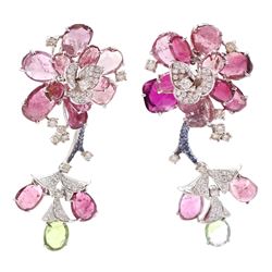 18ct white gold gemstone set floral jewellery suite, comprising necklace, pair of earrings and bracelet, each with tourmaline flower petals, round brilliant cut diamond centres and sapphire stems, stamped