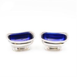 Pair of George III silver open salts, of rectangular form with gadrooned rim and upon a re...