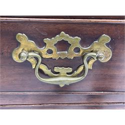 George III mahogany bureau, the conch inlaid fall front enclosing pigeon holes, shelves and central cupboard with inlaid flower motif, four graduating cock-beaded drawers below each with brass handles, lower moulded edge over shaped bracket feet