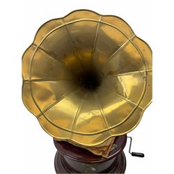 His Master's Voice table top wind up gramophone on a circular wooden base, with brass horn, H72cm, Horn D43cm. 