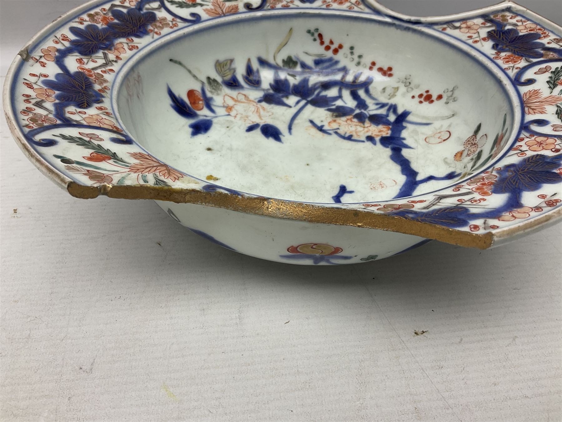 19th Century Imari pattern Japanese blood letting bowl, together with 19th century chinese blue and white square dish with decorated with blossoming flowers, together with thee blue and white saucers 
