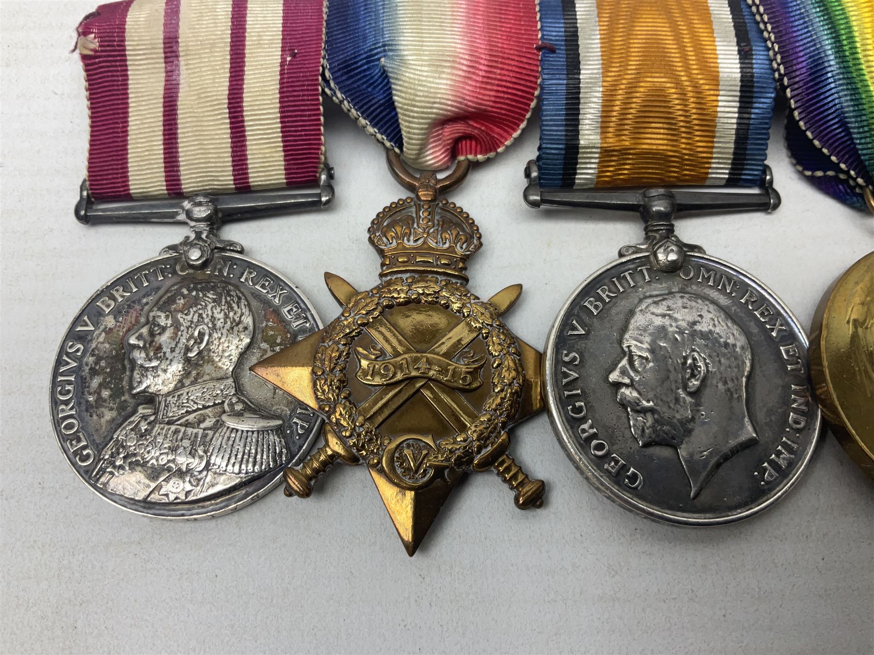 WW1 British Royal Navy Campaign and Royal Naval Fleet Reserve Long Service and Good Conduct group of five medals comprising British War Medal, 1914-15 Star and Victory Medal awarded to SS.113274 J.W. Baines Sto.1 R.N.; Naval general Service Medal to J.W. Baines Sto.1 N.B.; and Royal Fleet Reserve Long Service and Good Conduct Medal to SS.113274 (Dev. B.7397) J.W. Baines Sto.1 R.F.R.; all with ribbons