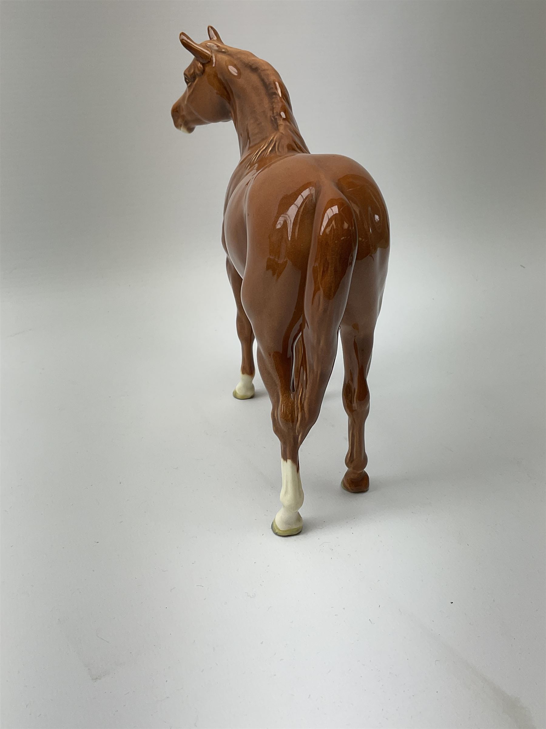 A Beswick figure modelled as a chestnut horse, probably model 1771, H19cm 