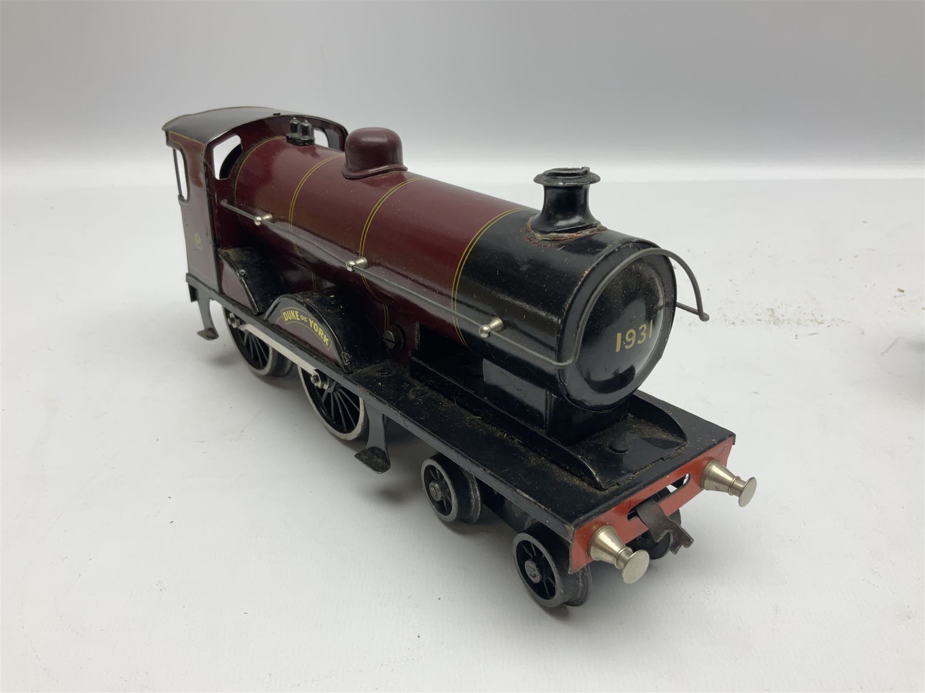 Bassett-Lowke '0' gauge - clockwork 4-4-0 locomotive 'Duke of York' No.1931 with tender, lithographed LMS crimson/black; original box with key