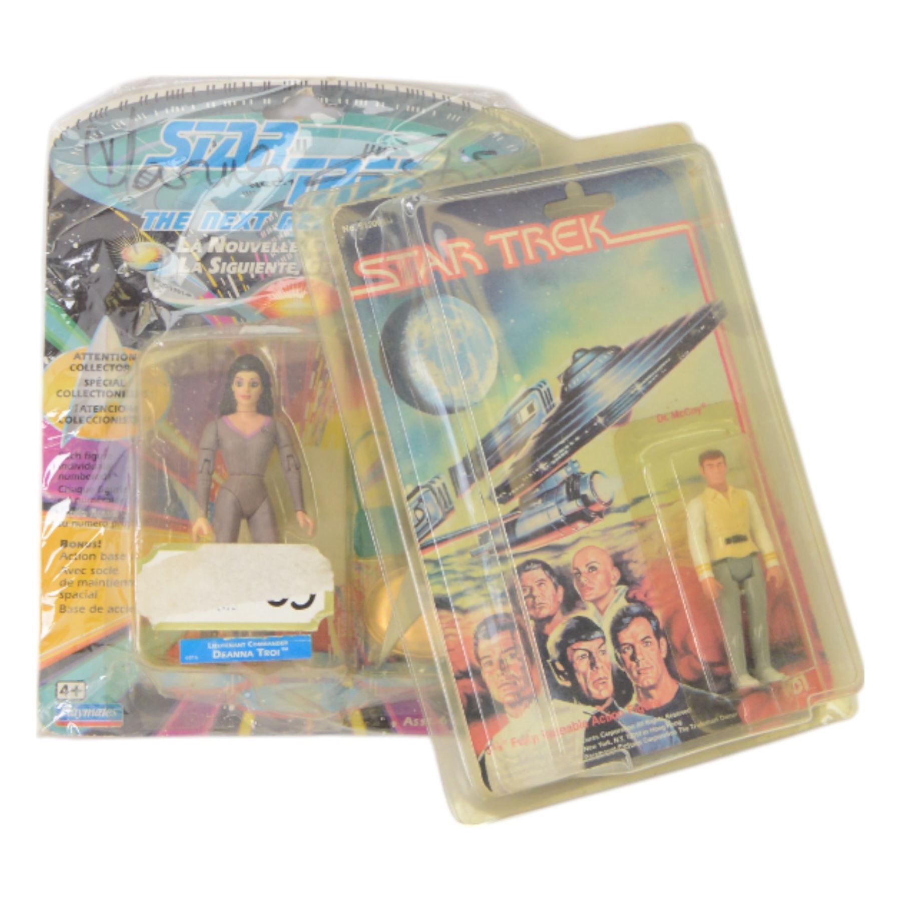 Mego Star Trek Dr McCoy 3 3/4 inch figurine, carded in blister packaging, together with a Bandai Star Trek Next Generation Deanna Troi figure, cared in blister packaging signed by Deanna Troi actress Marina Sirtis