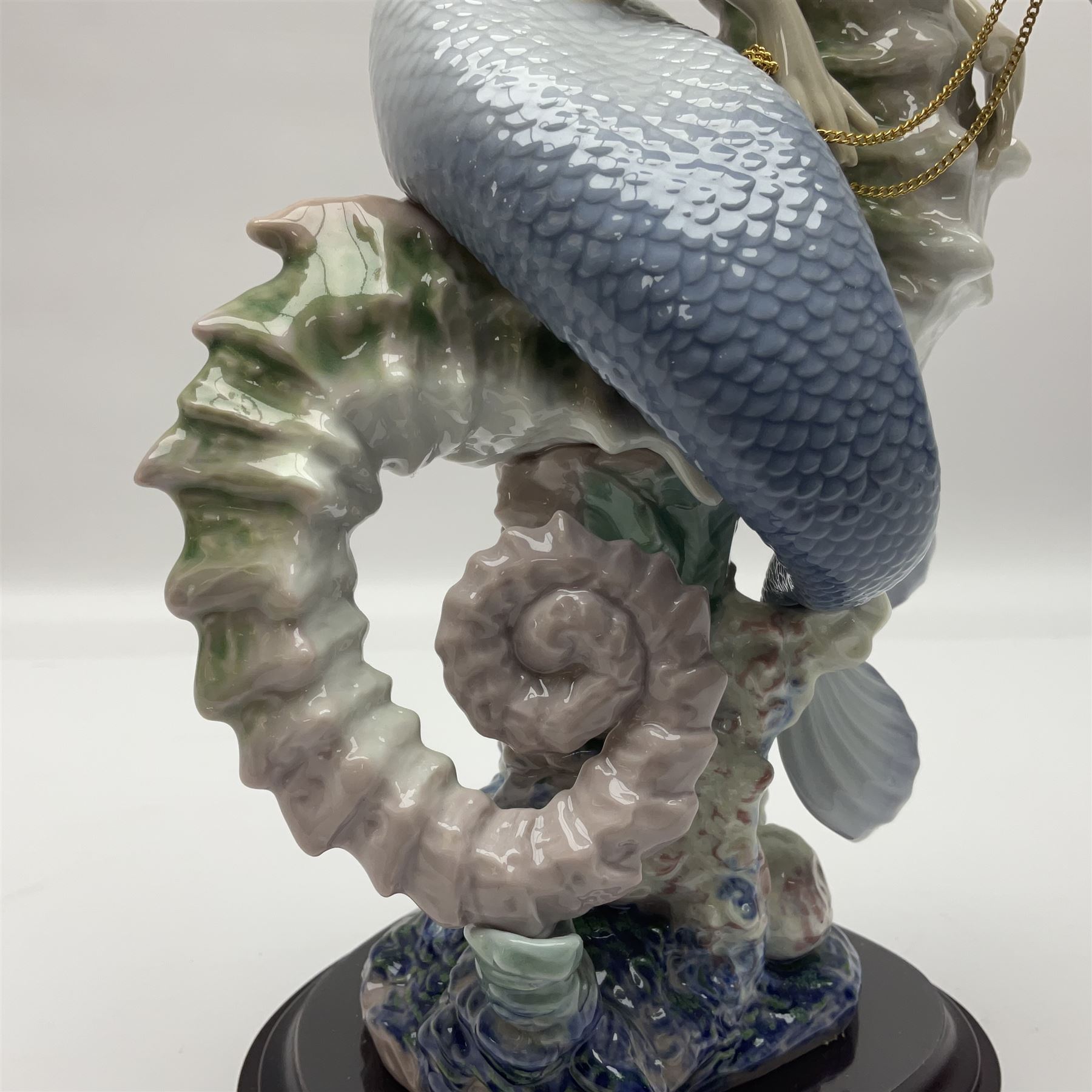 Lladro figure, Beneath the Waves, modelled as a mermaid and seahorse upon a wooden plinth, no 1822, limited edition 1389/2500, with certificate and original box, H32cm 