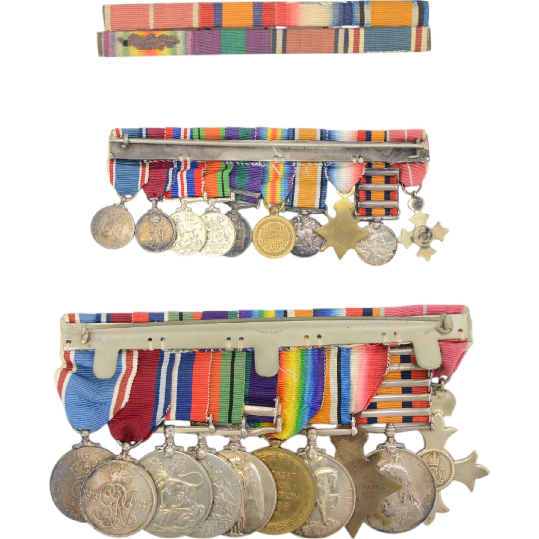Group of ten medals awarded to Major P.T Sanders; George V OBE, Queens South Africa medal with five clasps Cape Colony, Orange Free State, Transvaal, South Africa 1901 and South Africa 1902, 1914 Star, WWI British War medal, Victory medal with M.I.D. oak leaves, General Service medal with Kurdistan clasp, WWII Defence medal, 1939 - 1945 medal, King George V Jubilee medal and George VI Coronation medal, together with matching miniature medal set and ribbon bar, Moise Dreyfuss stop watch Mk II, no.3907, PT Sanders bible from 24th company 8th battalion Imperial Yeomanry, photographs and other military items    
