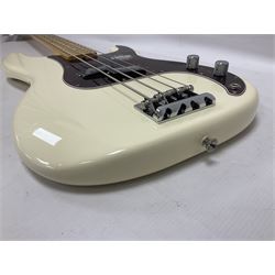 Fender Precision Bass guitar, in Olympic White finish with tortoiseshell effect scratchboard, serial no US15103092, in black Fender hard case with Fender strap and warranty card, guitar L116cm