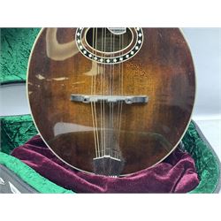 Eastman eight-string mandolin model MD504, serial no.140435406, L66cm; in TGI hard carrying case; together with case of instructional CDs