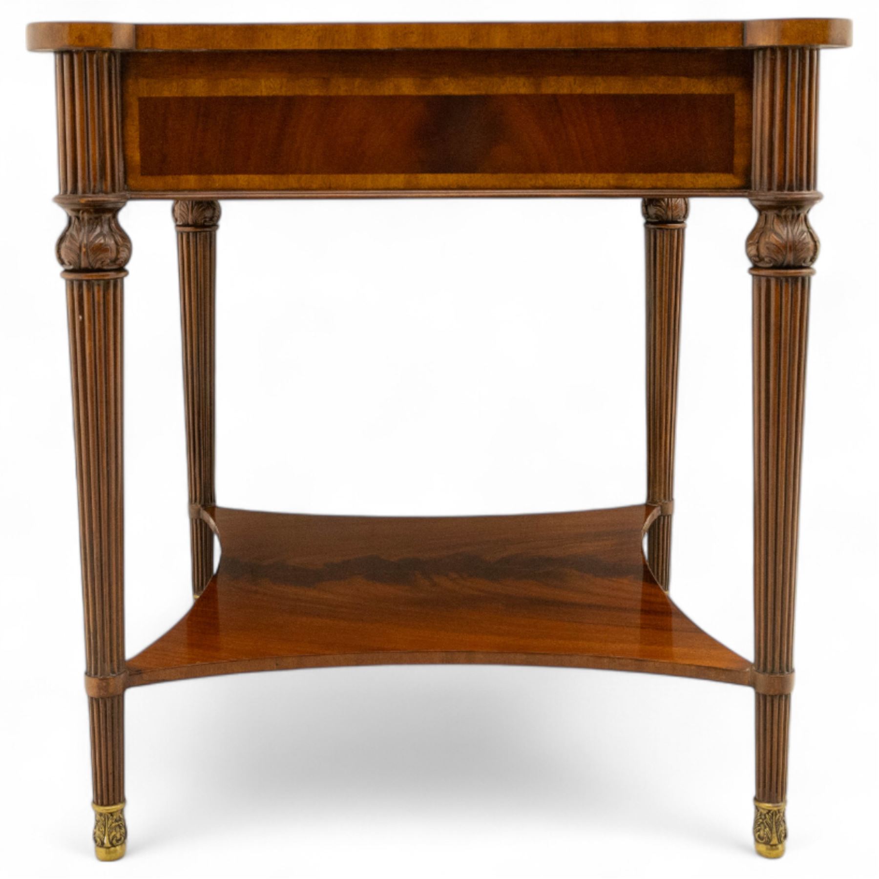 Maitland Smith - Pair of mahogany side tables, the rectangular top with rounded corners, the top edge inlaid with movingui wood, above two under-tier shelves, and frieze drawer, supported on stop-reed and acanthus foliate carved legs united by platform stretcher, raised on brass sabot foot caps
