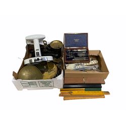 Collection of tools and measures comprising W. H. Harling draughtsmans part set in mahogany case, boxwood rules, brass and wooden levels cast iron scales, Salter's spring balance scale etc