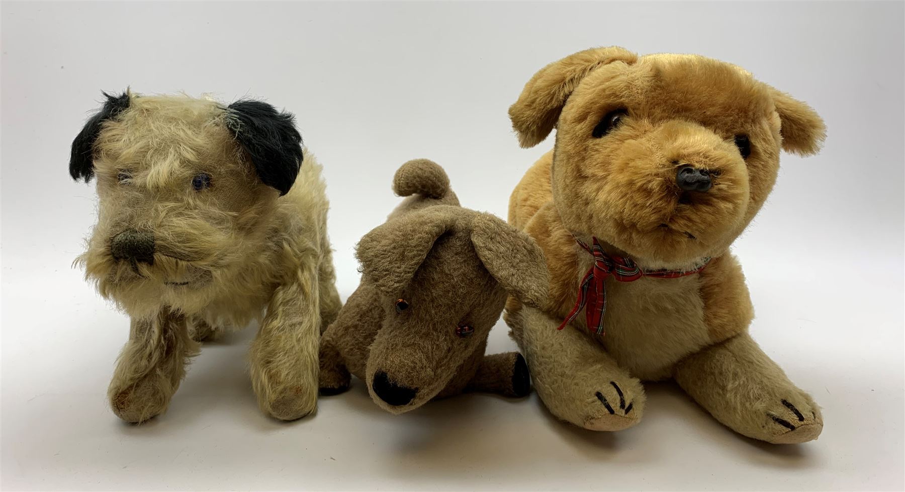 Three English dogs 1930s-60s including Deans Rag Book Co. Ltd. 'Childsplay' corgi in crouching position with two-tone body, glass type eyes and plastic nose with stitched mouth L18