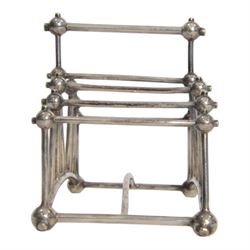 Christopher Dresser (1834-1904) for Hukin & Heath, silver plated six division bridge toast rack, circa 1880, Stamped makers marks and model number 2554, H12cm