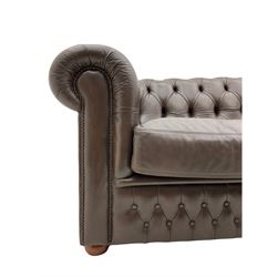 Chesterfield two seat sofa, upholstered in brown buttoned leather