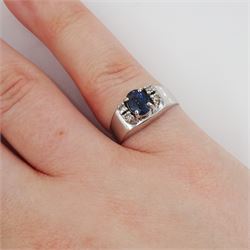 18ct white gold oval cut sapphire and four stone, round brilliant cut diamond ring, hallmarked, sapphire approx 0.60 carat